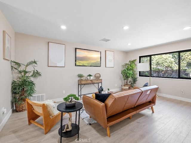 971 N Clifford Ave, Rialto, CA 92376 - living area featuring light wood finished floors and recessed lighting