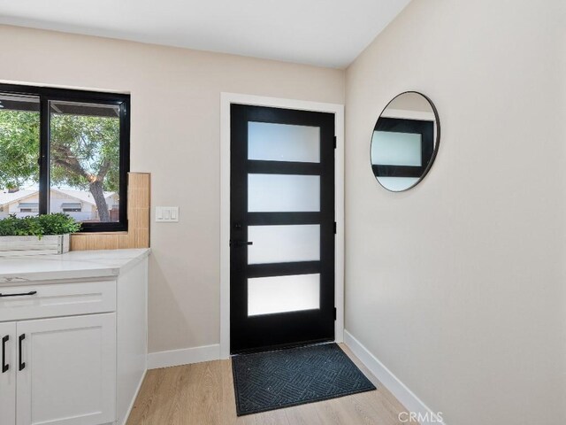 971 N Clifford Ave, Rialto, CA 92376 - foyer entrance with light wood-type flooring