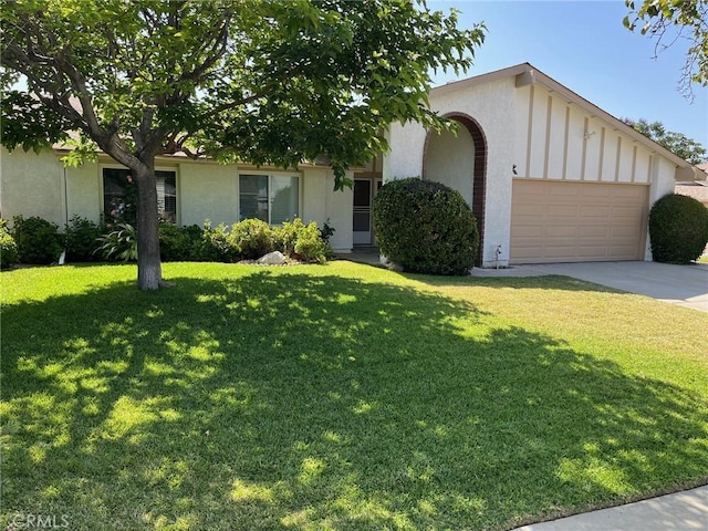1692 Taylor Ave, Corona, CA 92882 - ranch-style home with an attached garage, concrete driveway, a front yard, and stucco siding
