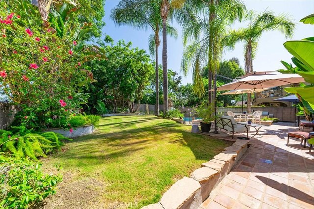 26301 Montarez Cir, Mission Viejo, CA 92691 - fenced backyard with a patio area