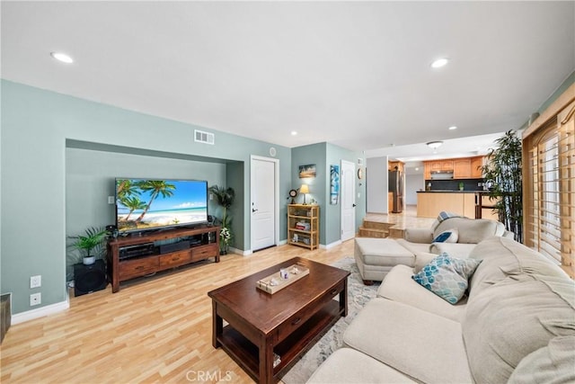 26301 Montarez Cir, Mission Viejo, CA 92691 - living area featuring recessed lighting and light wood-style flooring