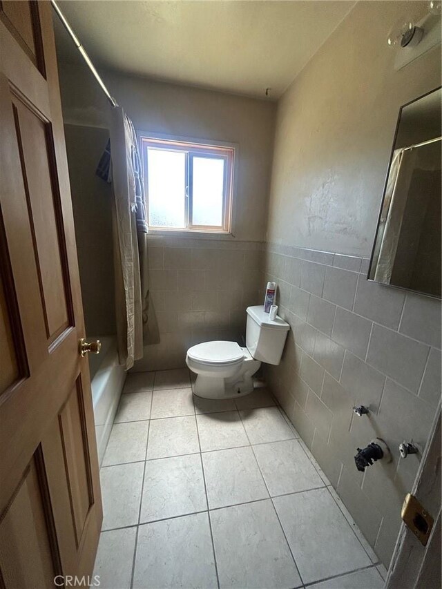 11818 Graystone, Norwalk, CA 90650 - full bathroom featuring tile walls, tile patterned floors, shower / bath combo, and wainscoting