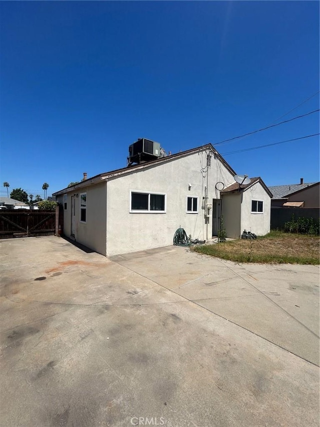 11818 Graystone, Norwalk, CA 90650 - back of house featuring stucco siding and a patio area