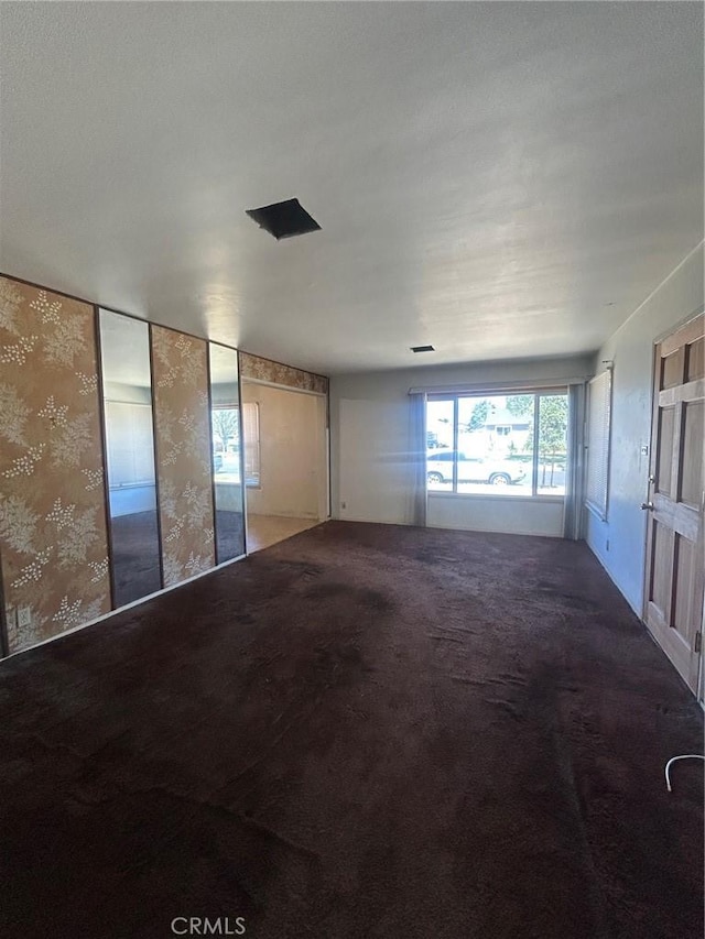 11818 Graystone, Norwalk, CA 90650 - spare room featuring wallpapered walls and carpet flooring