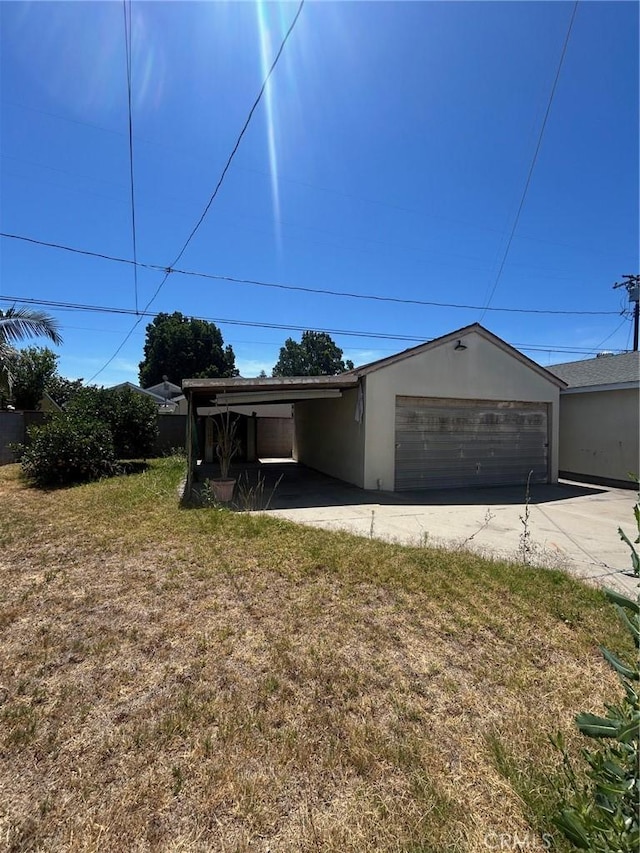 11818 Graystone, Norwalk, CA 90650 - view of front of home with stucco siding and a garage