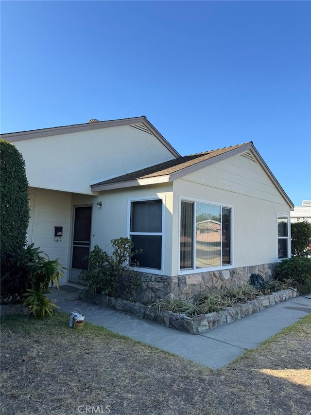 11818 Graystone, Norwalk, CA 90650 - view of front of property with stone siding