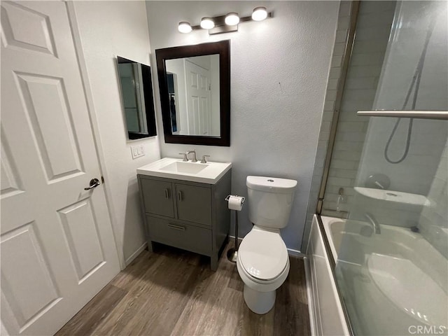 20331 Bluffside Cir Unit A320, Huntington Beach, CA 92646 - bathroom featuring wood finished floors, vanity, and bathing tub / shower combination