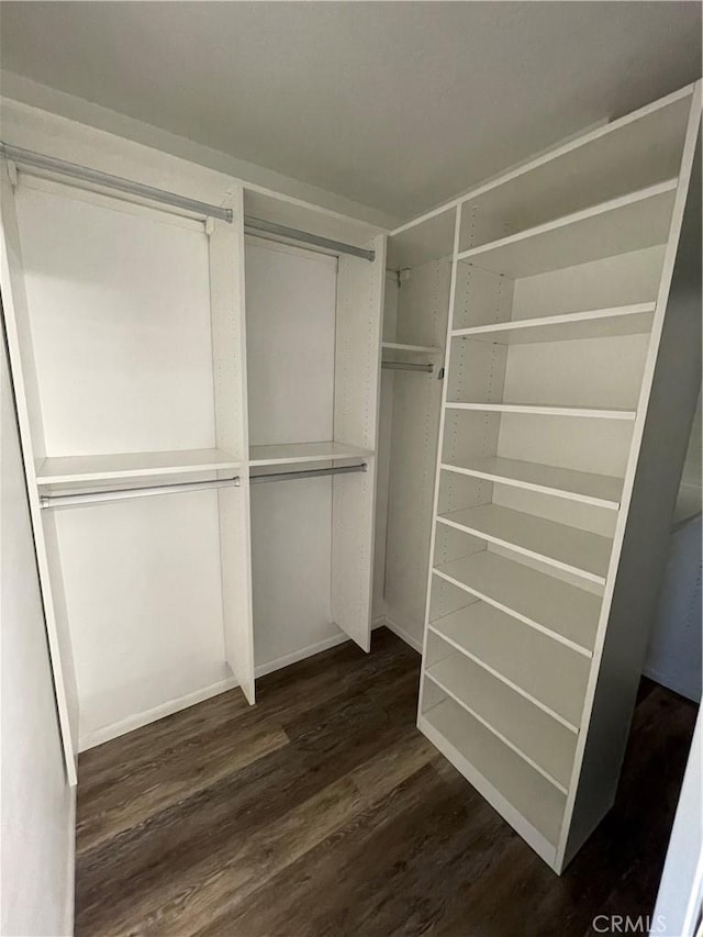 20331 Bluffside Cir Unit A320, Huntington Beach, CA 92646 - spacious closet featuring dark wood finished floors