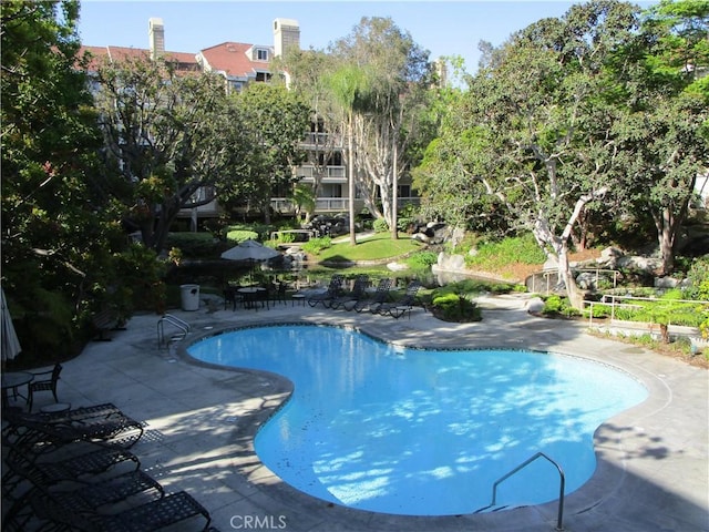 20331 Bluffside Cir Unit A320, Huntington Beach, CA 92646 - outdoor pool featuring a patio area