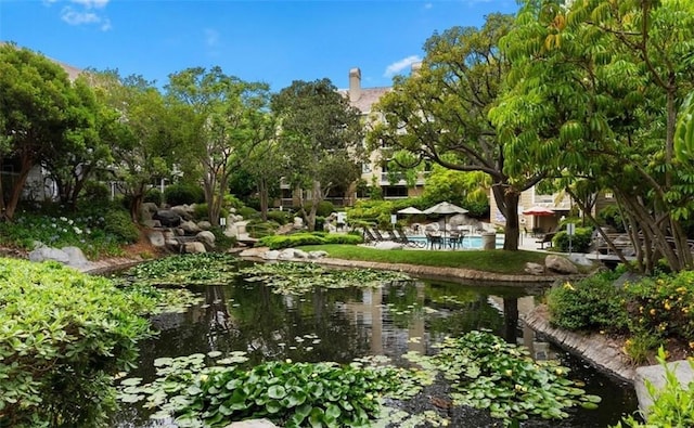 20331 Bluffside Cir Unit A320, Huntington Beach, CA 92646 - view of community with a garden pond