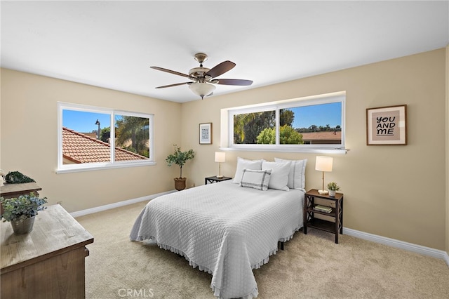 33262 Paseo Molinos, San Juan Capistrano, CA 92675 - bedroom featuring light colored carpet, multiple windows, and a ceiling fan