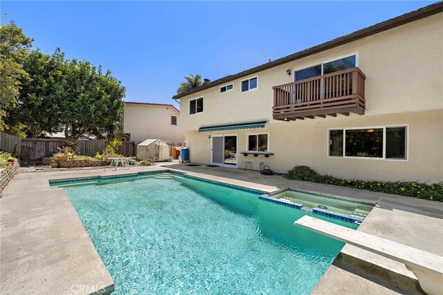 33262 Paseo Molinos, San Juan Capistrano, CA 92675 - view of pool with a fenced backyard, a patio, a pool with connected hot tub, and a diving board