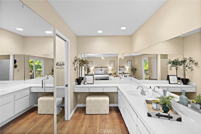 33262 Paseo Molinos, San Juan Capistrano, CA 92675 - bathroom featuring wood finished floors, vanity, and recessed lighting