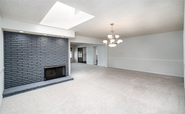 26409 Brandywine Ct, Menifee, CA 92586 - unfurnished living room featuring carpet floors, a chandelier, a textured ceiling, a fireplace, and a skylight