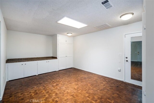 26409 Brandywine Ct, Menifee, CA 92586 - spare room with a textured ceiling