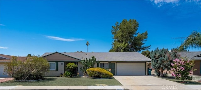 26409 Brandywine Ct, Menifee, CA 92586 - ranch-style home featuring an attached garage, concrete driveway, and a front lawn