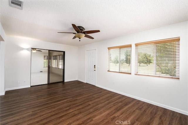 26409 Brandywine Ct, Menifee, CA 92586 - spare room with a ceiling fan, dark wood-style flooring, and a textured ceiling