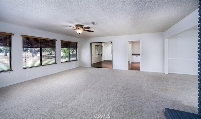 26409 Brandywine Ct, Menifee, CA 92586 - carpeted empty room featuring ceiling fan and a textured ceiling