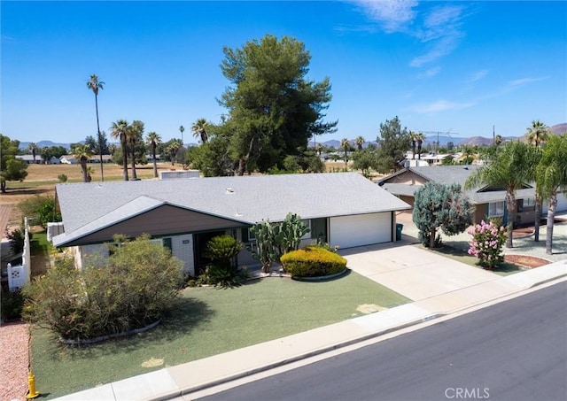 26409 Brandywine Ct, Menifee, CA 92586 - single story home featuring driveway, an attached garage, and a residential view