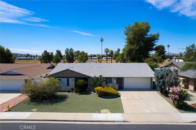26409 Brandywine Ct, Menifee, CA 92586 - ranch-style house featuring concrete driveway, a garage, and a front yard