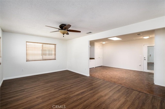26409 Brandywine Ct, Menifee, CA 92586 - empty room featuring dark wood-style floors, a textured ceiling, and ceiling fan