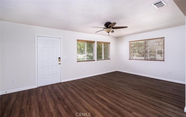 26409 Brandywine Ct, Menifee, CA 92586 - spare room featuring ceiling fan, dark wood finished floors, and a textured ceiling