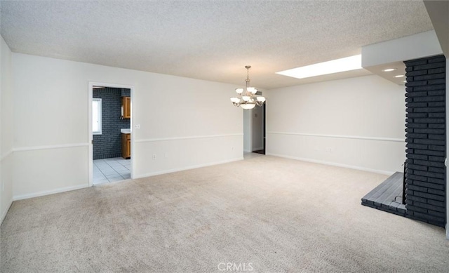 26409 Brandywine Ct, Menifee, CA 92586 - unfurnished living room with a chandelier, carpet floors, and a textured ceiling