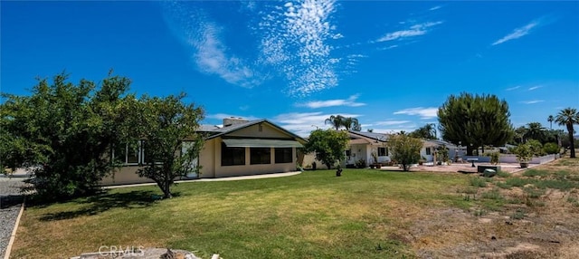 26409 Brandywine Ct, Menifee, CA 92586 - back of property featuring a yard and solar panels