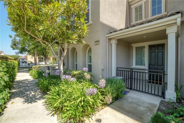 3393 Shadetree Way, Camarillo, CA 93012 - view of exterior entry featuring stucco siding and a porch