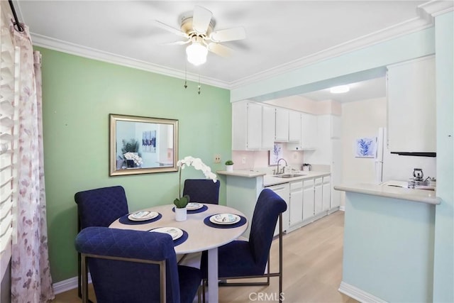 3511 Elm Ave Unit 212, Long Beach, CA 90807 - dining space with ornamental molding, a ceiling fan, and light wood finished floors