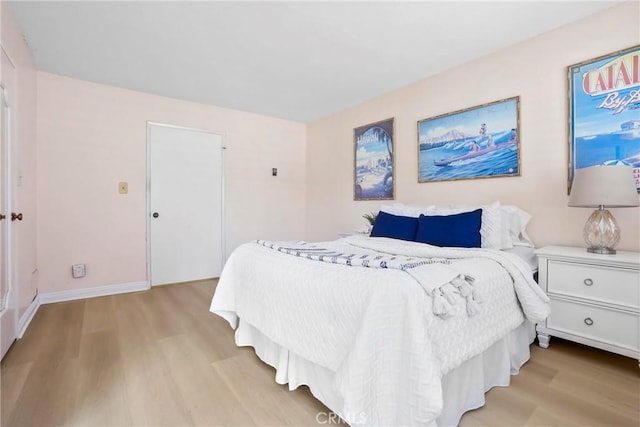 3511 Elm Ave Unit 212, Long Beach, CA 90807 - bedroom with light wood-style flooring and baseboards