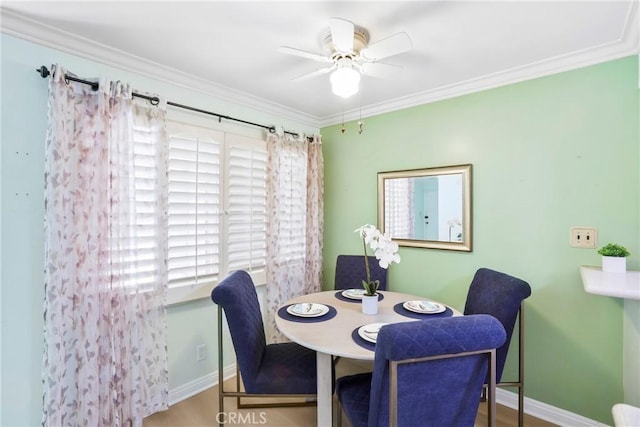 3511 Elm Ave Unit 212, Long Beach, CA 90807 - dining area with ceiling fan and crown molding