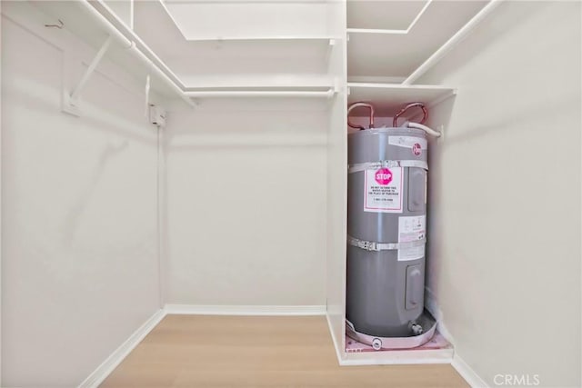 3511 Elm Ave Unit 212, Long Beach, CA 90807 - spacious closet featuring secured water heater and wood finished floors