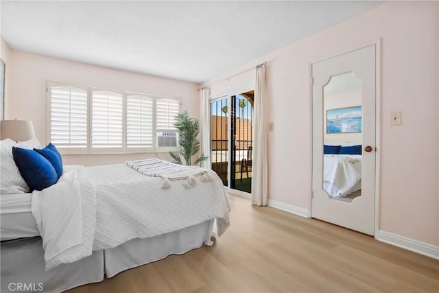 3511 Elm Ave Unit 212, Long Beach, CA 90807 - bedroom with access to outside and wood finished floors