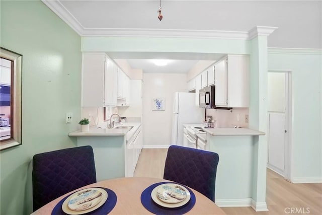 3511 Elm Ave Unit 212, Long Beach, CA 90807 - dining area featuring light wood-style flooring and ornamental molding