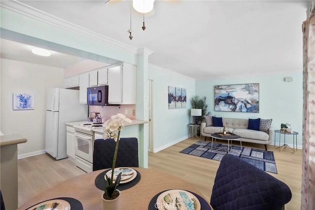 3511 Elm Ave Unit 212, Long Beach, CA 90807 - dining space featuring light wood-style floors, ornamental molding, and a ceiling fan