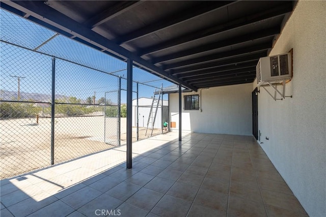 72011 Two Mile Rd Unit 29, Palms, CA 92277 - view of patio with a shed and an attached carport
