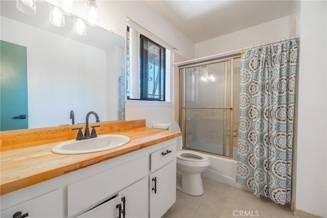 72011 Two Mile Rd Unit 29, Palms, CA 92277 - full bath with tile patterned floors, vanity, and shower / bath combination with glass door