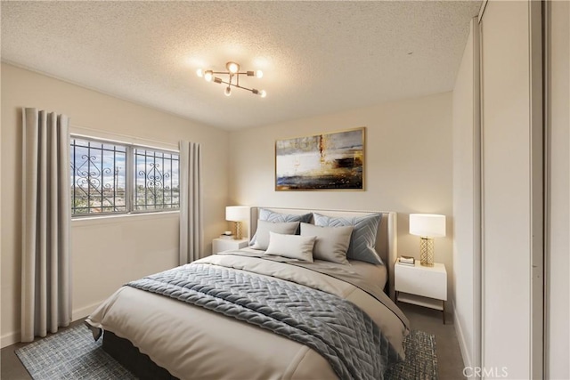 72011 Two Mile Rd Unit 29, Palms, CA 92277 - bedroom featuring a textured ceiling