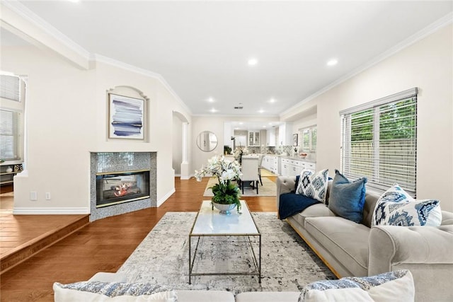 826 Country Oaks Ln, Arcadia, CA 91006 - living room featuring wood finished floors, ornamental molding, a multi sided fireplace, and recessed lighting