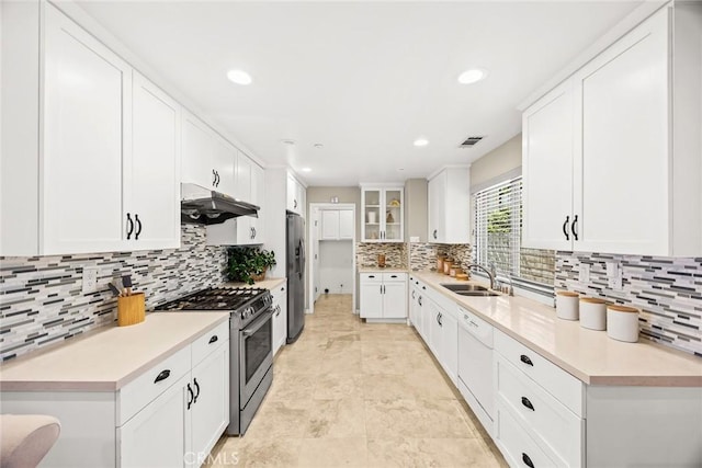 826 Country Oaks Ln, Arcadia, CA 91006 - kitchen featuring stainless steel appliances, under cabinet range hood, decorative backsplash, white cabinets, and recessed lighting