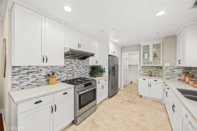 826 Country Oaks Ln, Arcadia, CA 91006 - kitchen with appliances with stainless steel finishes, under cabinet range hood, backsplash, white cabinetry, and recessed lighting