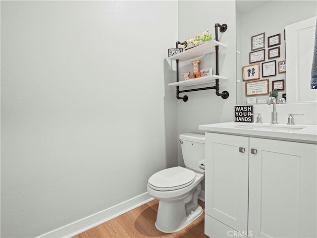 27717 Knoll View Pl, Valencia, CA 91381 - half bathroom with vanity and wood finished floors