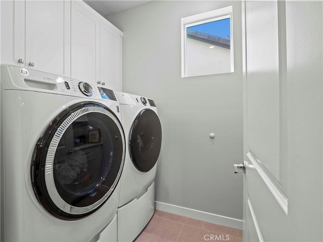 27717 Knoll View Pl, Valencia, CA 91381 - laundry room featuring independent washer and dryer, cabinet space, and light tile patterned flooring