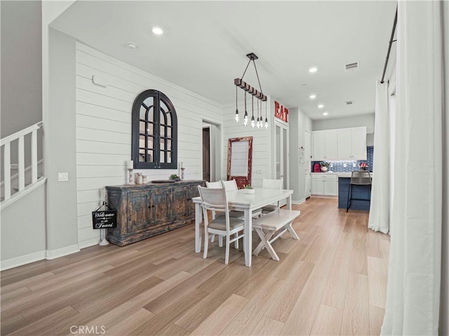 27717 Knoll View Pl, Valencia, CA 91381 - dining area with light wood-style floors, recessed lighting, and stairs