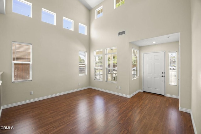 724 Parrish St, Ventura, CA 93003 - foyer featuring hardwood / wood-style flooring and a towering ceiling
