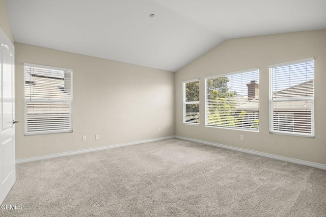 724 Parrish St, Ventura, CA 93003 - carpeted spare room featuring baseboards and lofted ceiling
