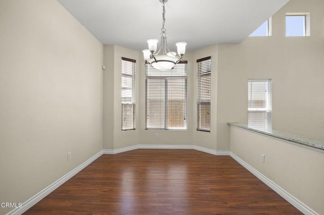 724 Parrish St, Ventura, CA 93003 - unfurnished dining area featuring a chandelier and wood finished floors