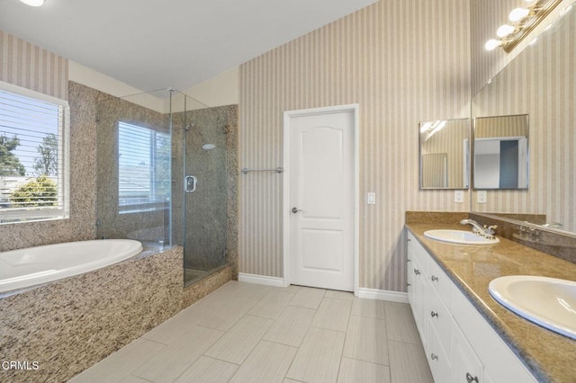 724 Parrish St, Ventura, CA 93003 - bathroom featuring a shower stall, a bath, double vanity, wallpapered walls, and tile patterned floors