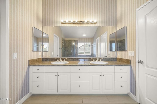 724 Parrish St, Ventura, CA 93003 - full bath with wallpapered walls, double vanity, tiled shower, and tile patterned flooring